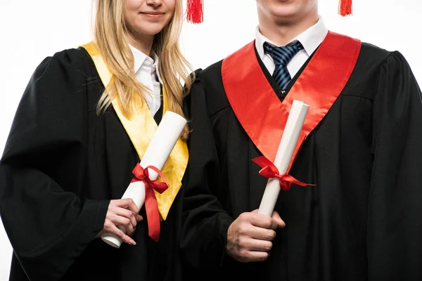 Front view of students holding diplomas isolated on white — Stock Photo