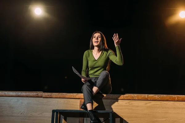 Emotional beautiful actress performing role on stage in theatre — Stock Photo