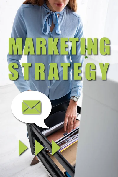 Selective focus of businesswoman searching dossier in cabinet driver, marketing strategy illustration — Stock Photo