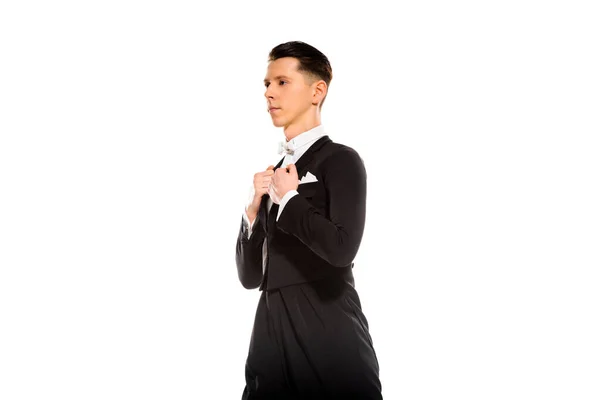 Elegant young ballroom dancer in suit isolated on white — Stock Photo