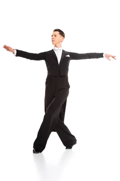 Elegante joven bailarina de salón bailando aislado en blanco - foto de stock