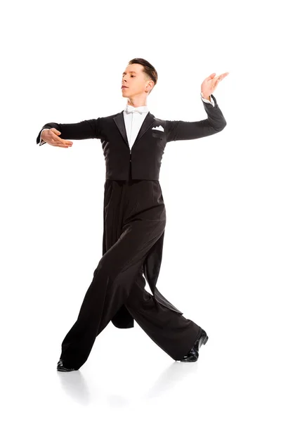 Elegante joven bailarina de salón bailando aislado en blanco - foto de stock