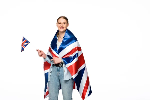 Happy pretty girl with braid and uk flags isolated on white — Stock Photo