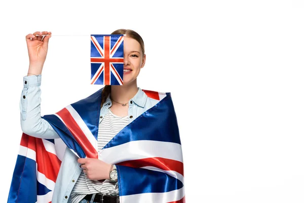 Happy pretty girl with obscure face and uk flags isolated on white — Stock Photo