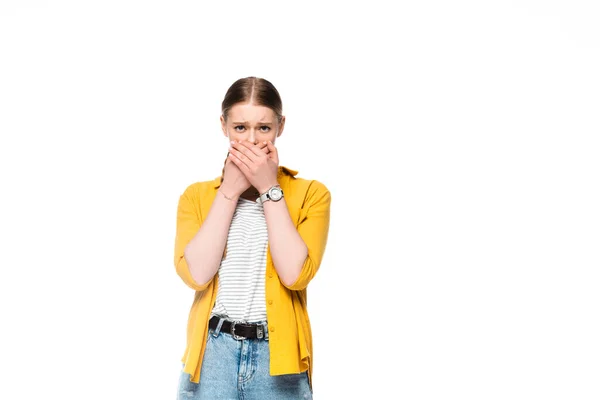 Attractive girl with braid covering mouth with hands isolated on white — Stock Photo