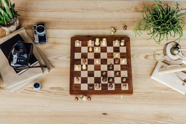 chess board set with old cameras 