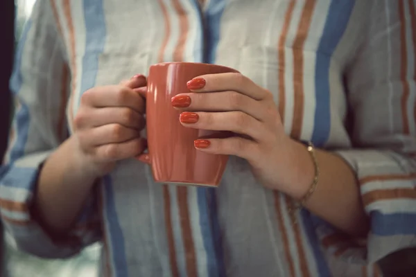 Woman with coffee cup — Stock Photo, Image