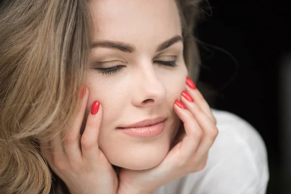 Woman with red manicure — Stock Photo, Image