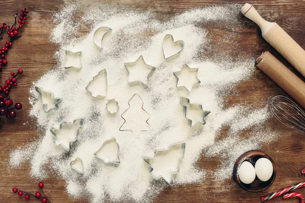 Forms and ingredients for christmas cookies — Stock Photo, Image