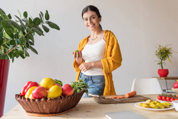 woman with fresh apple