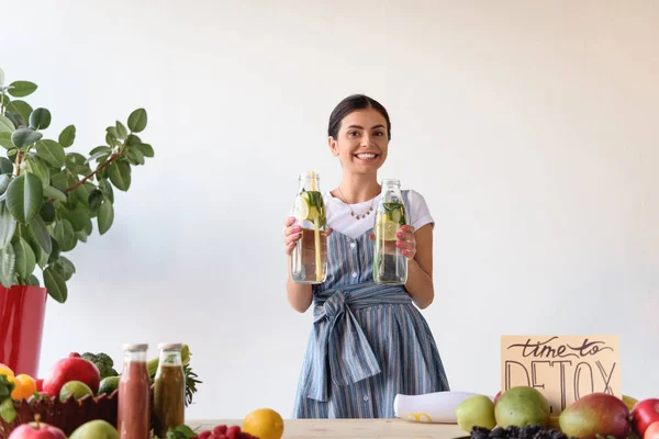 Woman with detox drinks — Stock Photo, Image