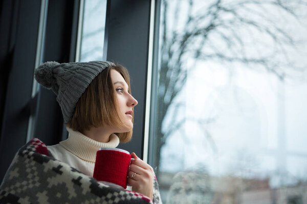 girl holding red cup