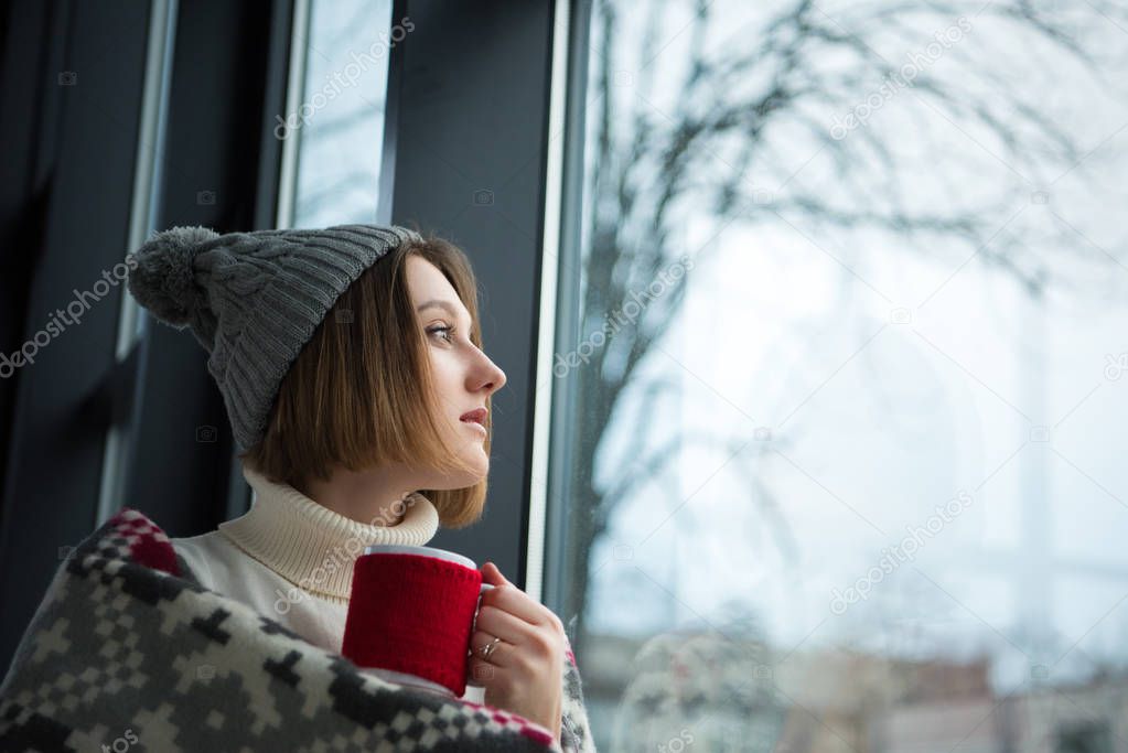 girl holding red cup