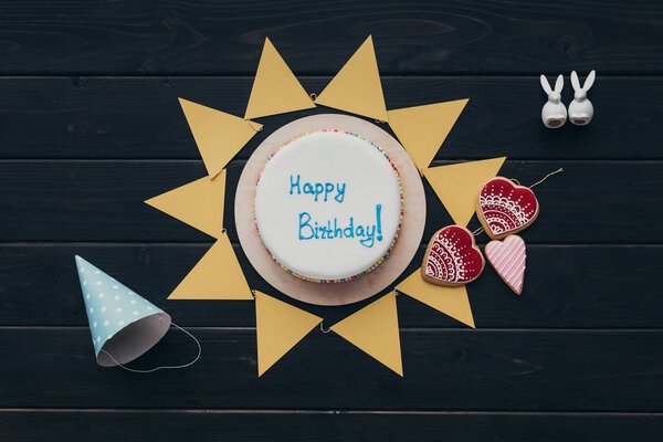 triangular paper garland and birthday cake