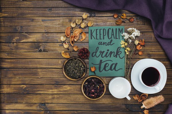 cups, dry tea and card  