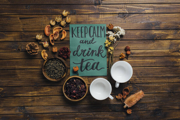 cups, dry tea and card 