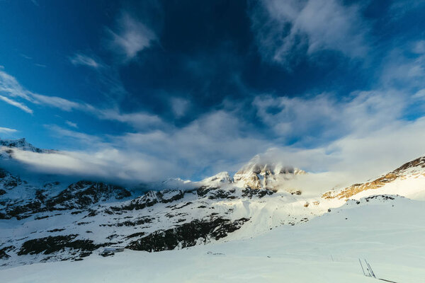tranquil snowy mountains landscape with blue sky, Austria