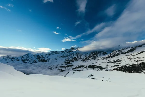 beautiful mountains landscape under blue sky with tiny clouds, Austria