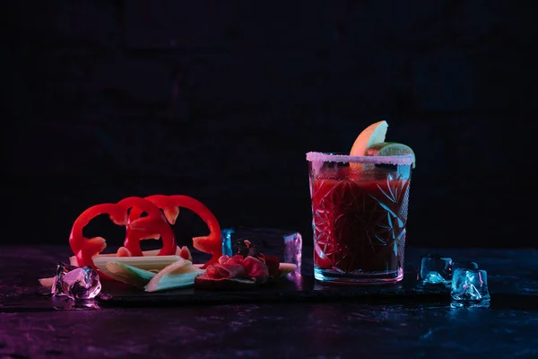 Delicious Bloody Mary Cocktail Glass Vegetables Melting Ice Cubes Dark — Stock Photo, Image