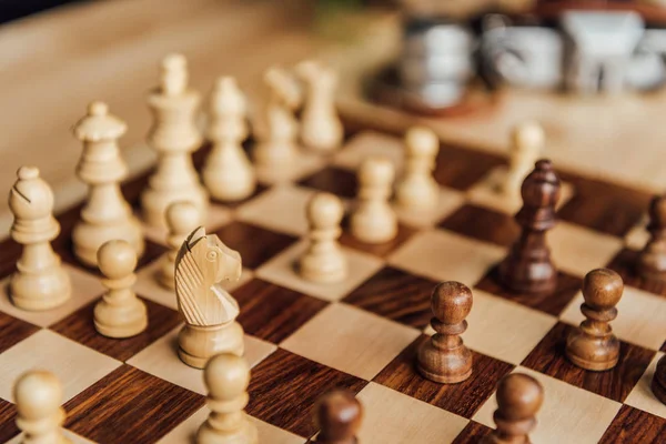 Old wooden chess board — Stock Photo