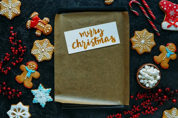 Christmas card on baking tray — Stock Photo