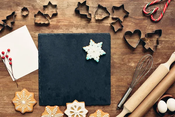 Forms and ingredients for christmas cookies — Stock Photo