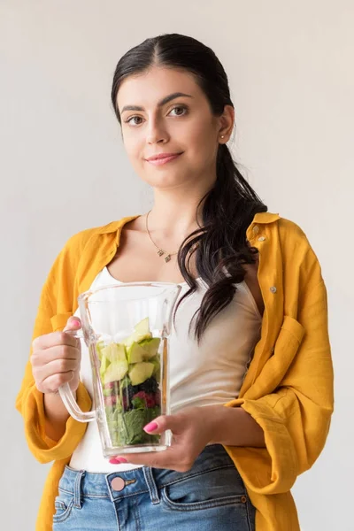 Woman with glass jar with fresh food — Stock Photo