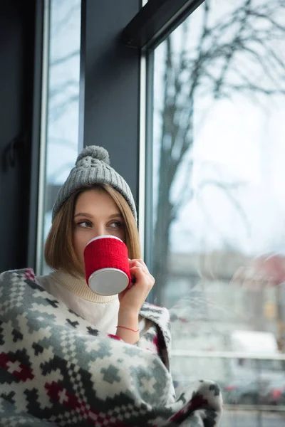 Girl drinking tea — Stock Photo