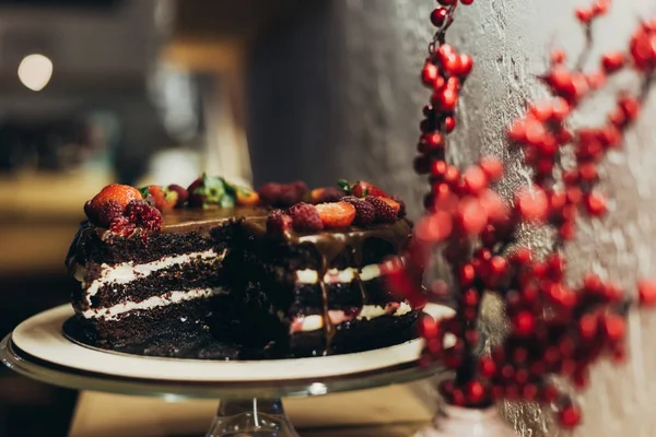 Chocolate cake on cake stand — Stock Photo