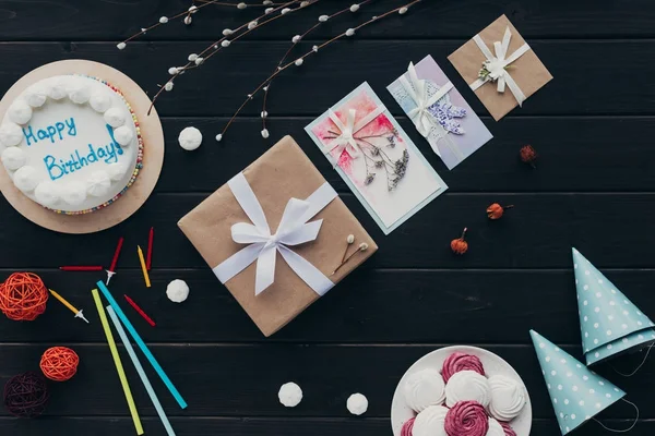 Present box and postcards — Stock Photo