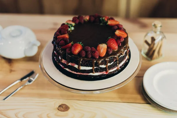 Chocolate cake with fruits — Stock Photo