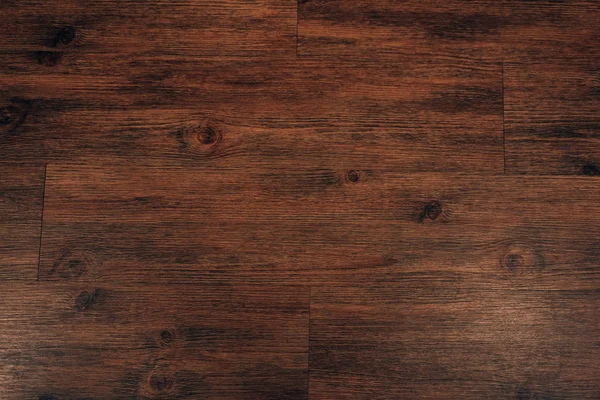 Vue de dessus du fond en bois brun foncé — Photo de stock