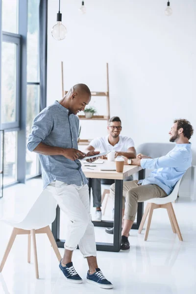 Multicultural businessmen in office — Stock Photo, Image