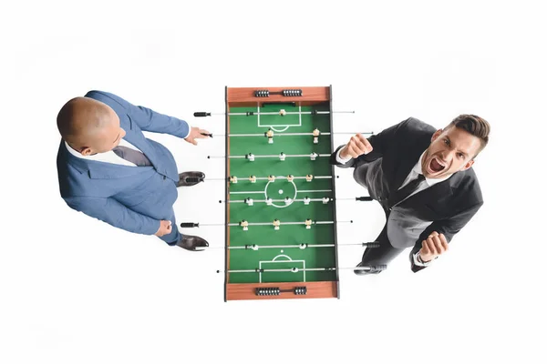 Businessmen playing table football — Stock Photo, Image