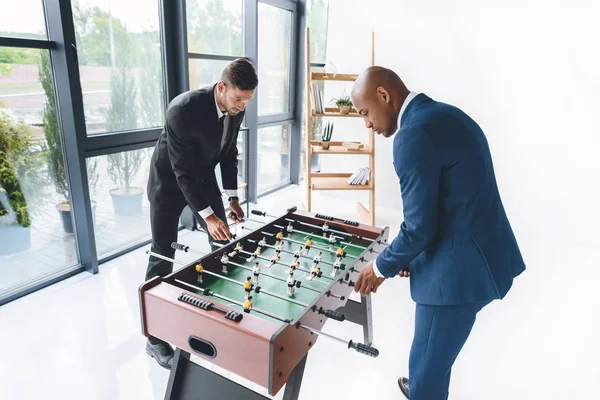 Businessmen playing table football — Stock Photo, Image