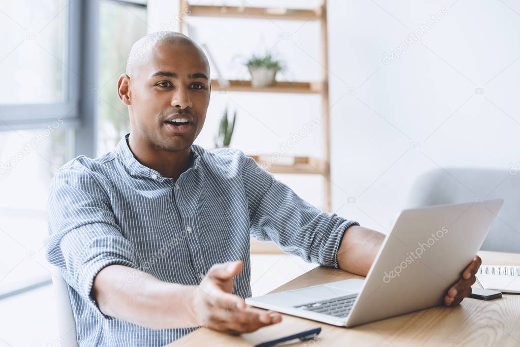 african american businessman with laptop