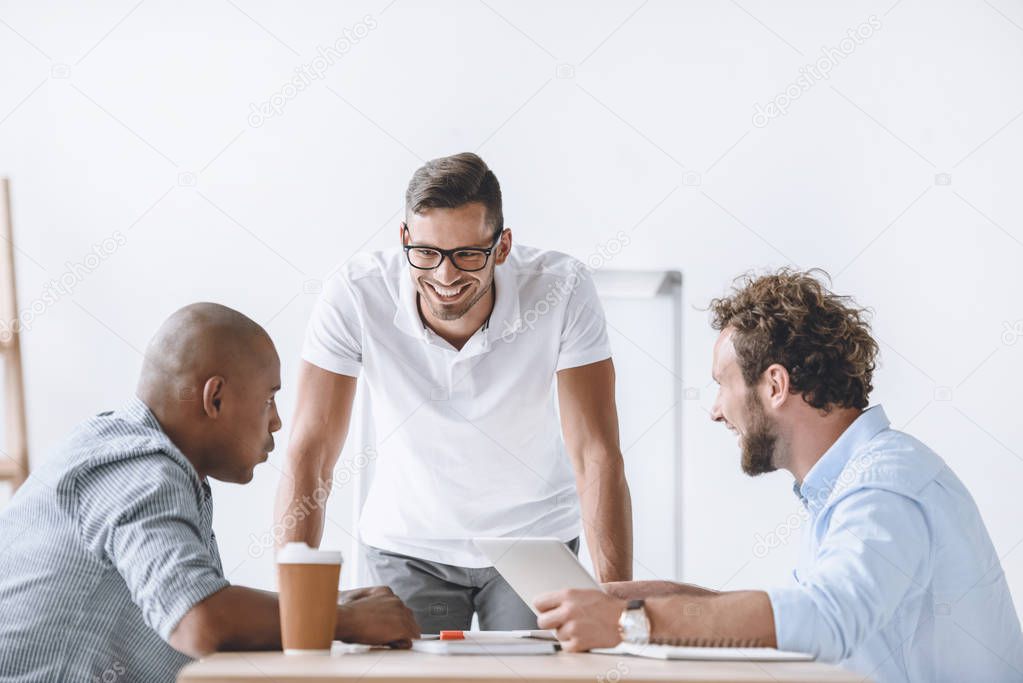 multiethnic businessmen at meeting