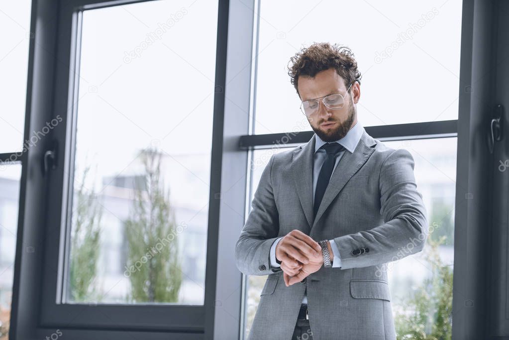 businessman checking time