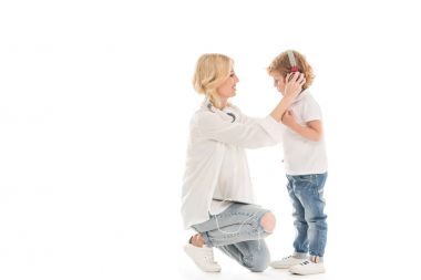 mother and son with headphones clipart
