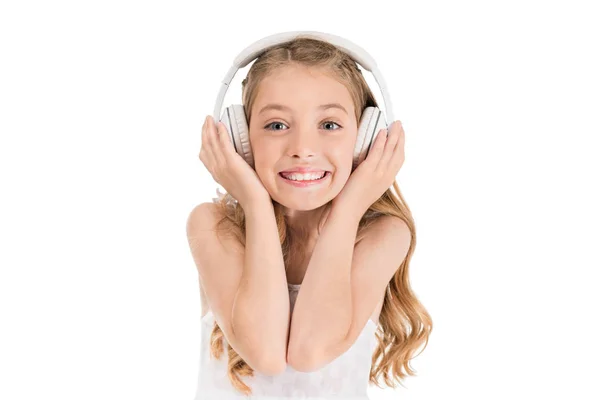 Usmívající se dítě v sluchátka — Stock fotografie