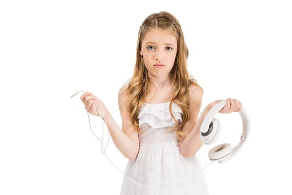 Verärgertes Kind mit Kopfhörern — Stockfoto