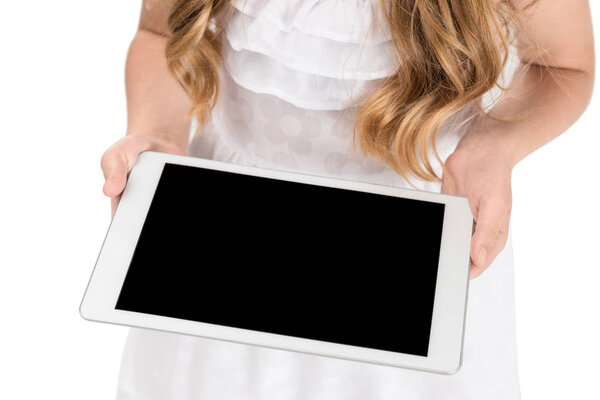 kid with tablet in hands