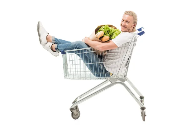 Hombre con bolsa de compras de papel — Foto de Stock