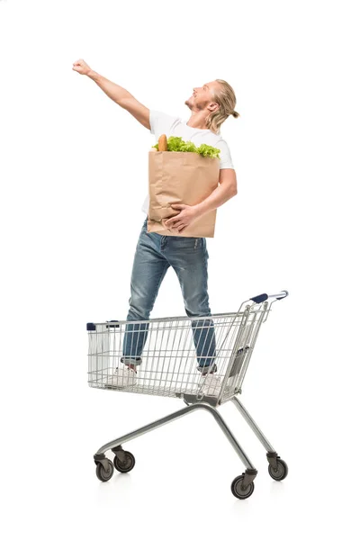 Hombre con bolsa de compras de papel — Foto de Stock
