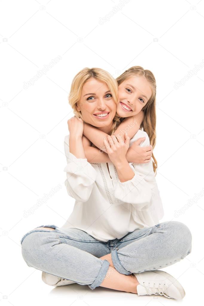 daughter hugging mother