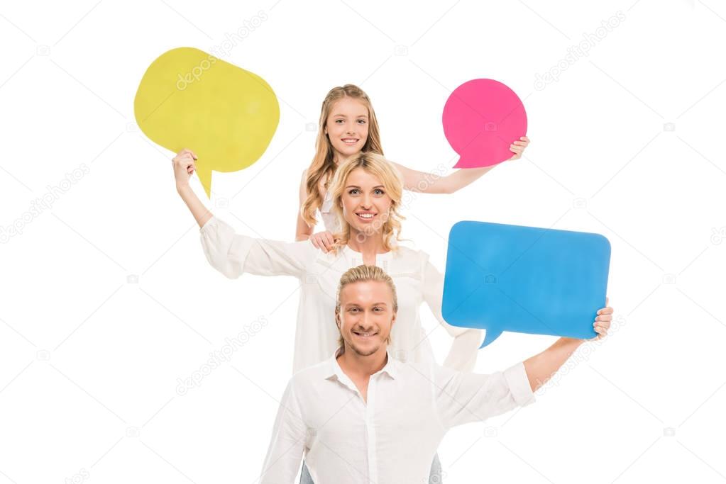 family with blank colorful banners