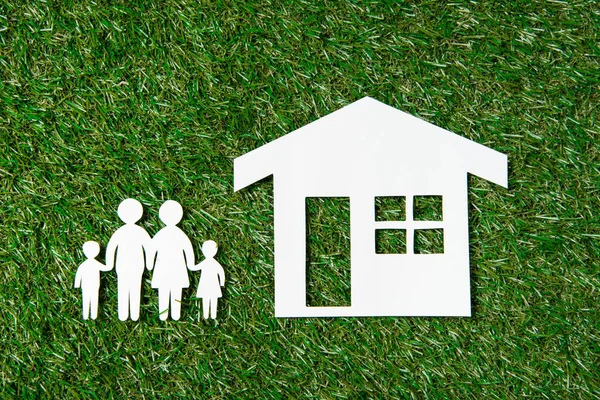 Life insurance concept on grass — Stock Photo