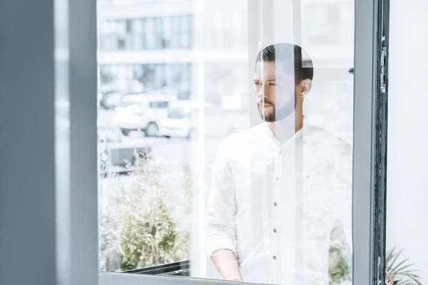 Pensive caucasian businessman — Stock Photo