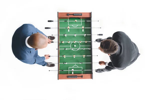 Businessmen playing table football — Stock Photo