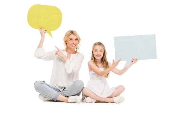 Mother and daughter with blank cards — Stock Photo